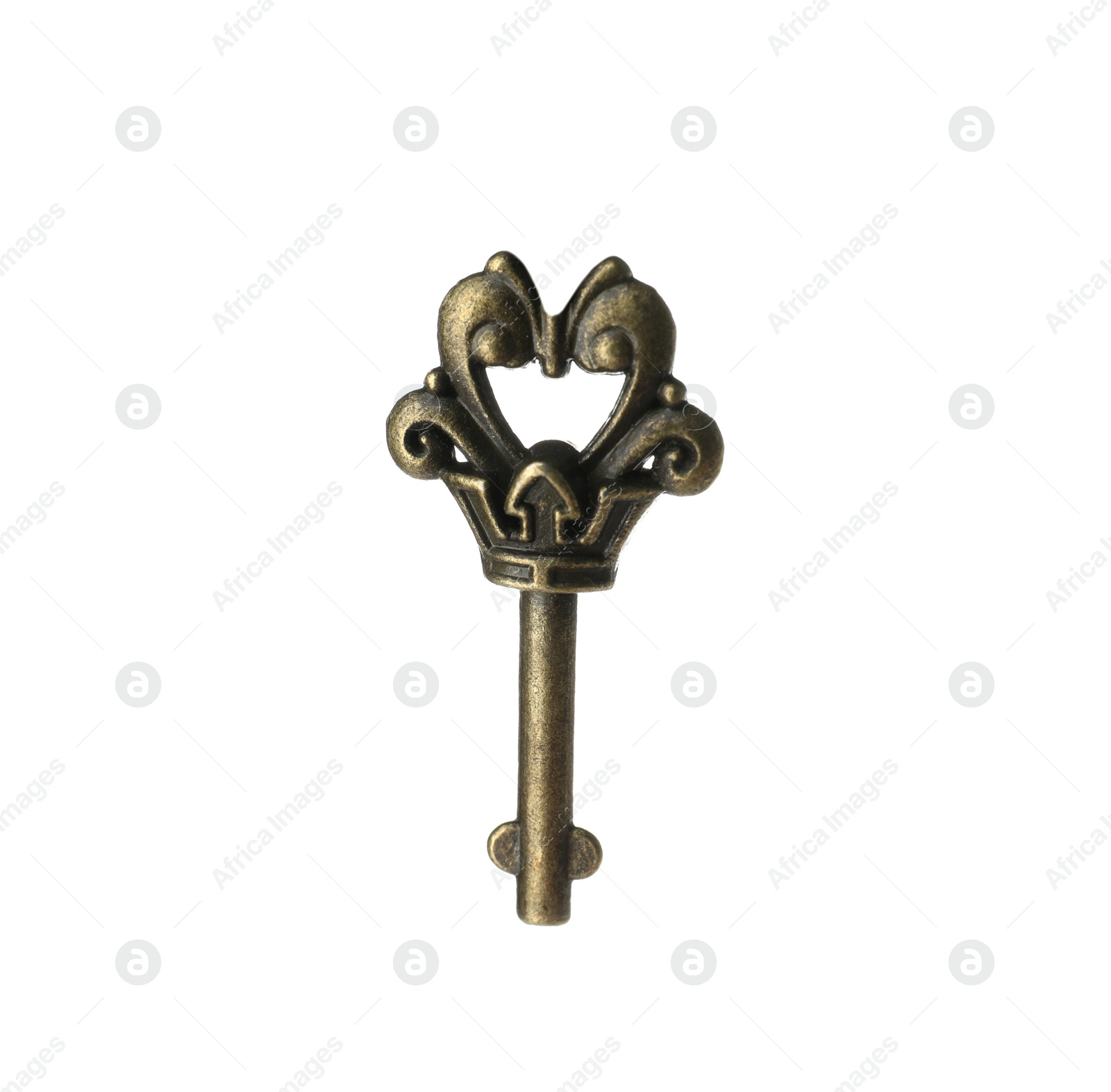 Photo of Bronze vintage ornate key on white background