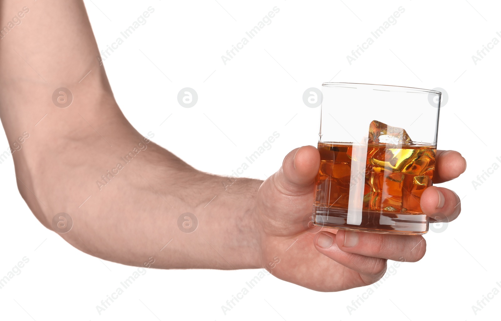 Photo of Man holding glass of whiskey with ice cubes on white background, closeup