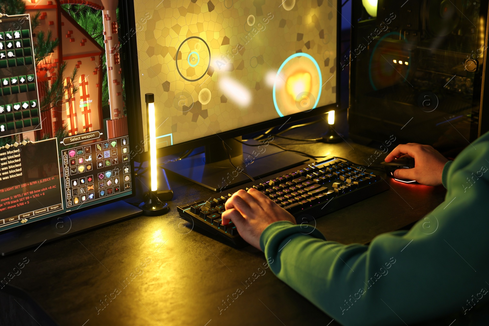 Photo of Man playing video games on computer indoors, closeup