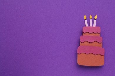 Photo of Birthday party. Paper cake on purple background, top view with space for text