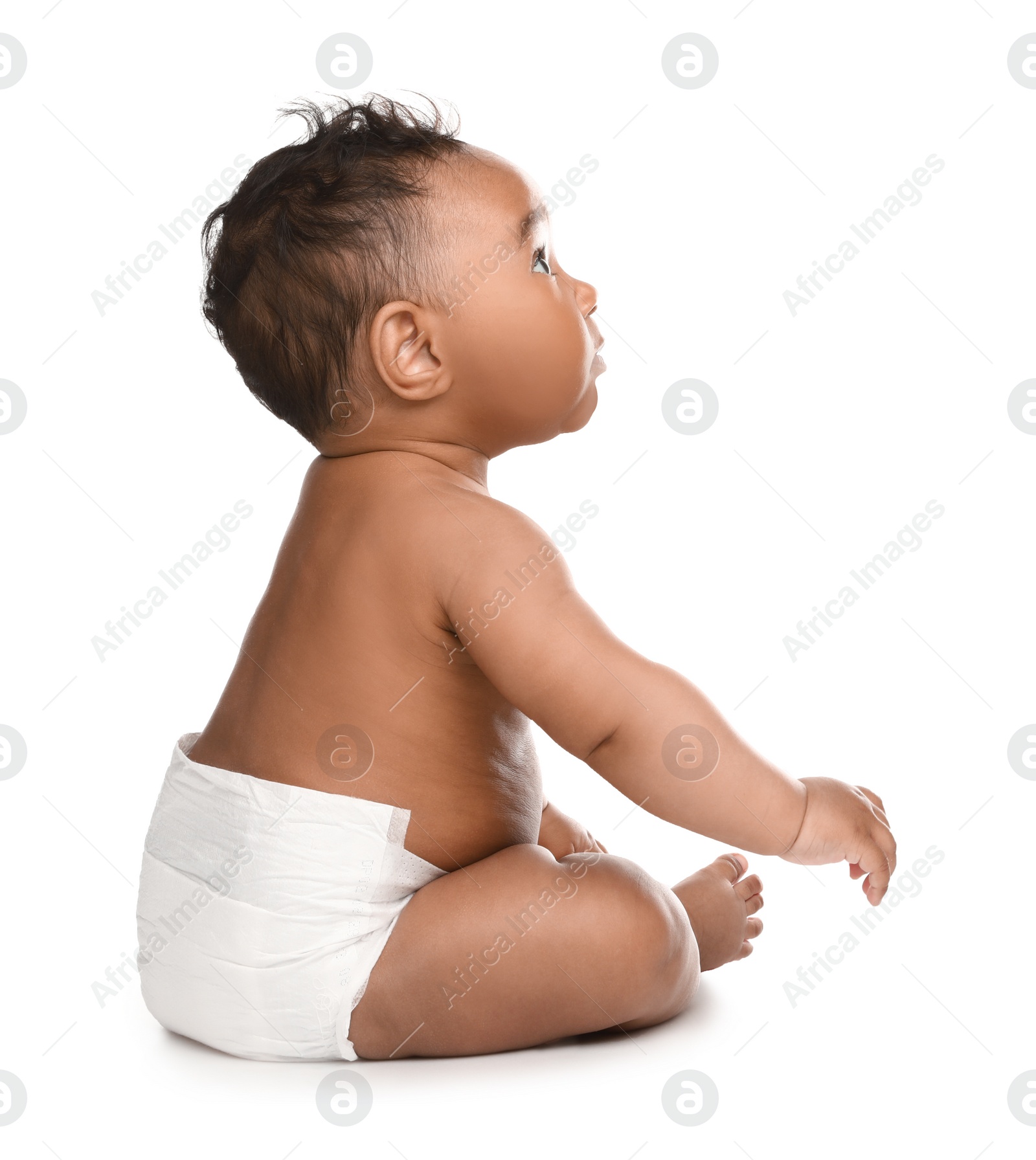 Photo of Adorable African-American baby in diaper on white background