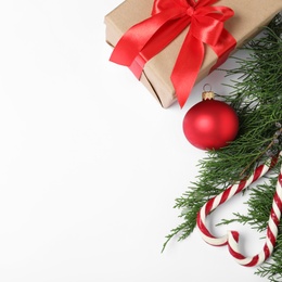 Photo of Composition with Christmas gift box on white background, top view