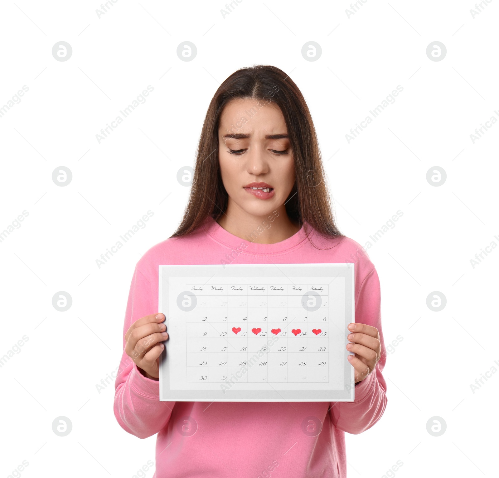 Photo of Young woman holding calendar with marked menstrual cycle days isolated on white