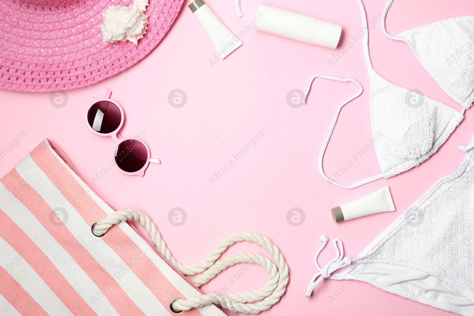 Photo of Flat lay composition with stylish bikini on color background. Space for text