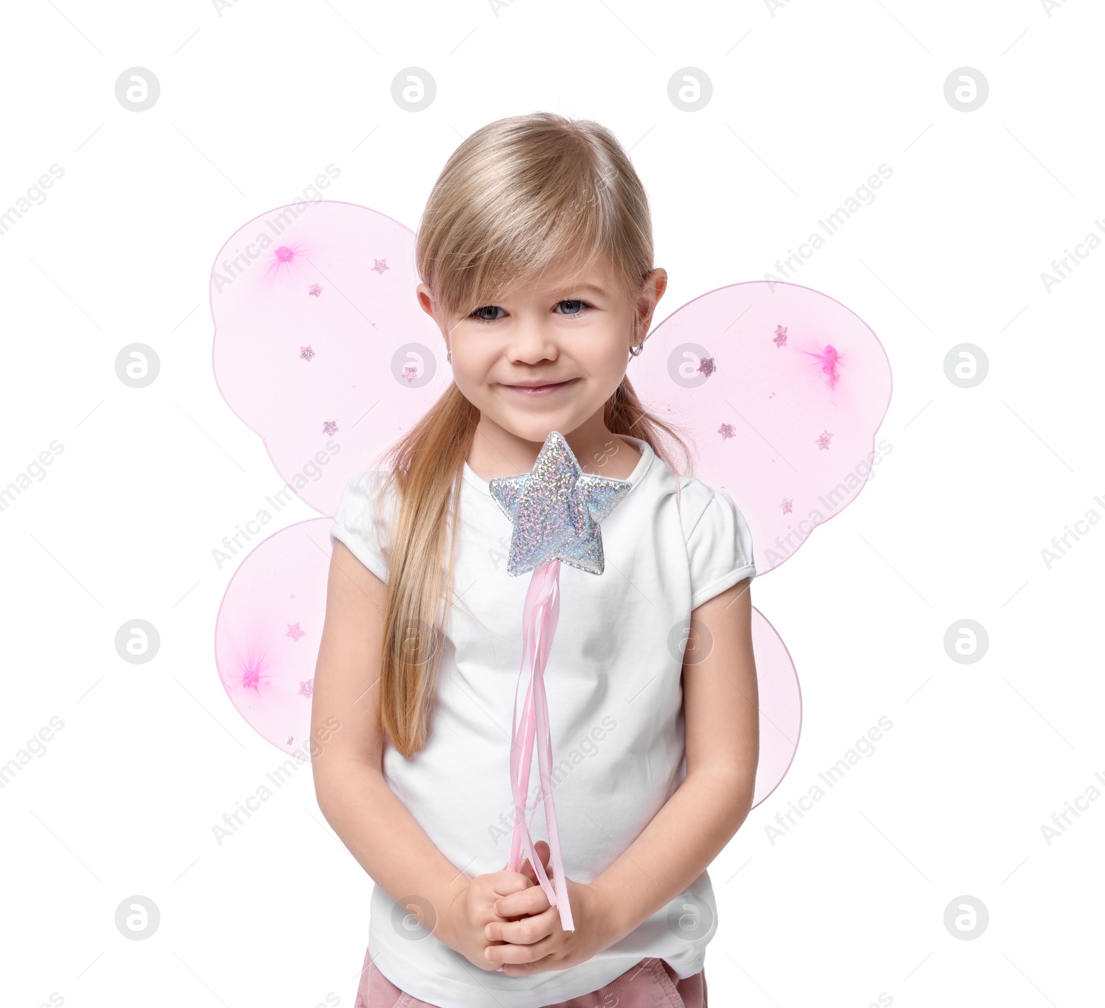 Photo of Cute little girl in fairy costume with pink wings and magic wand on white background