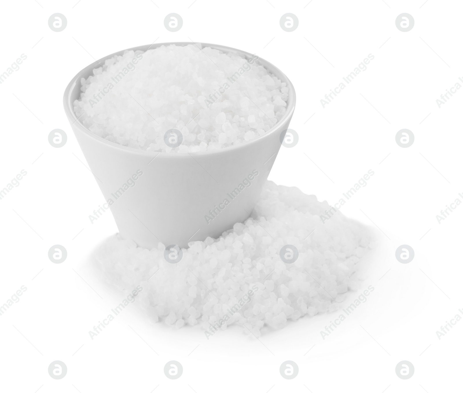 Photo of Ceramic bowl with natural sea salt isolated on white