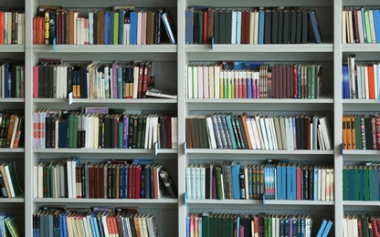 Photo of View of shelves with books in library