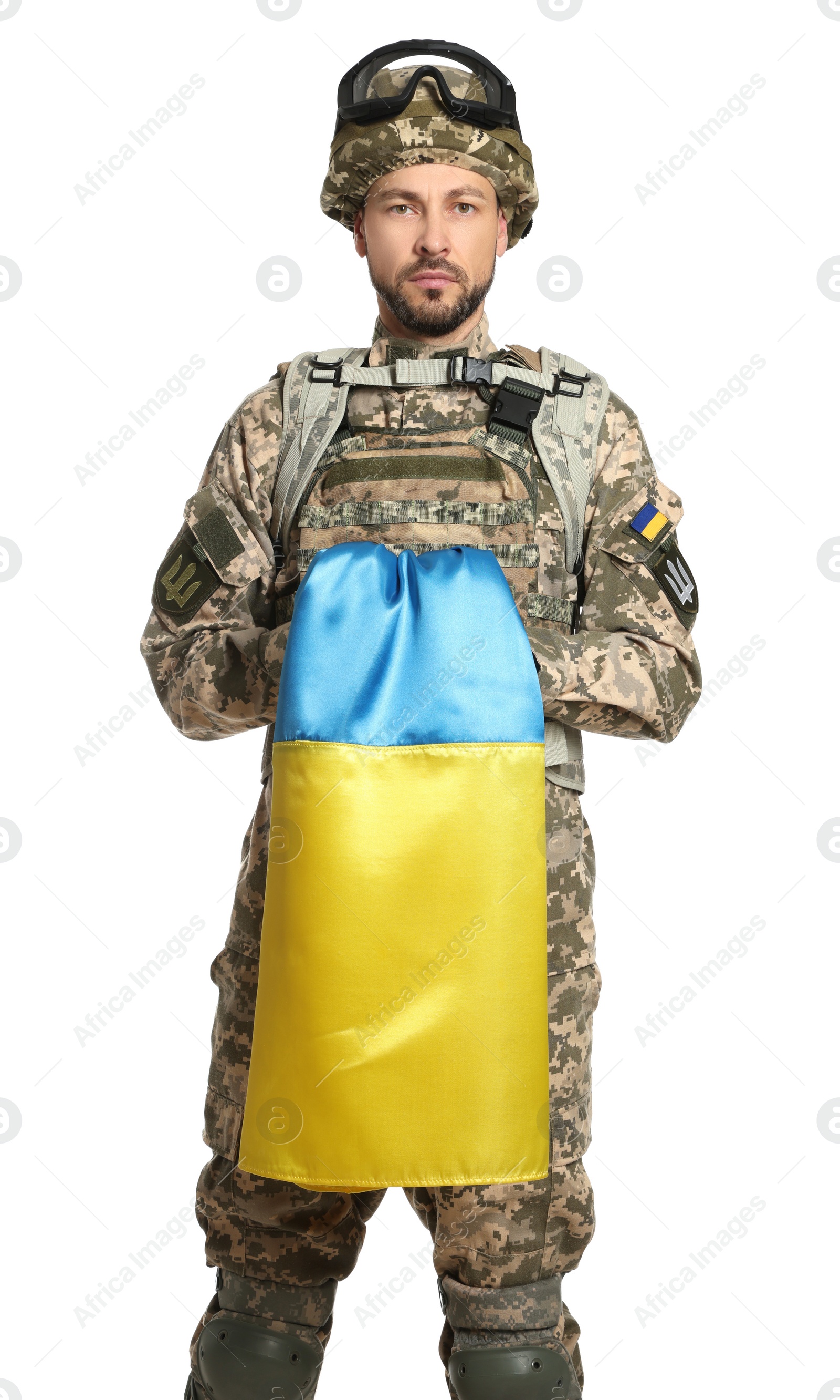 Photo of Soldier in military uniform with Ukrainian flag on white background