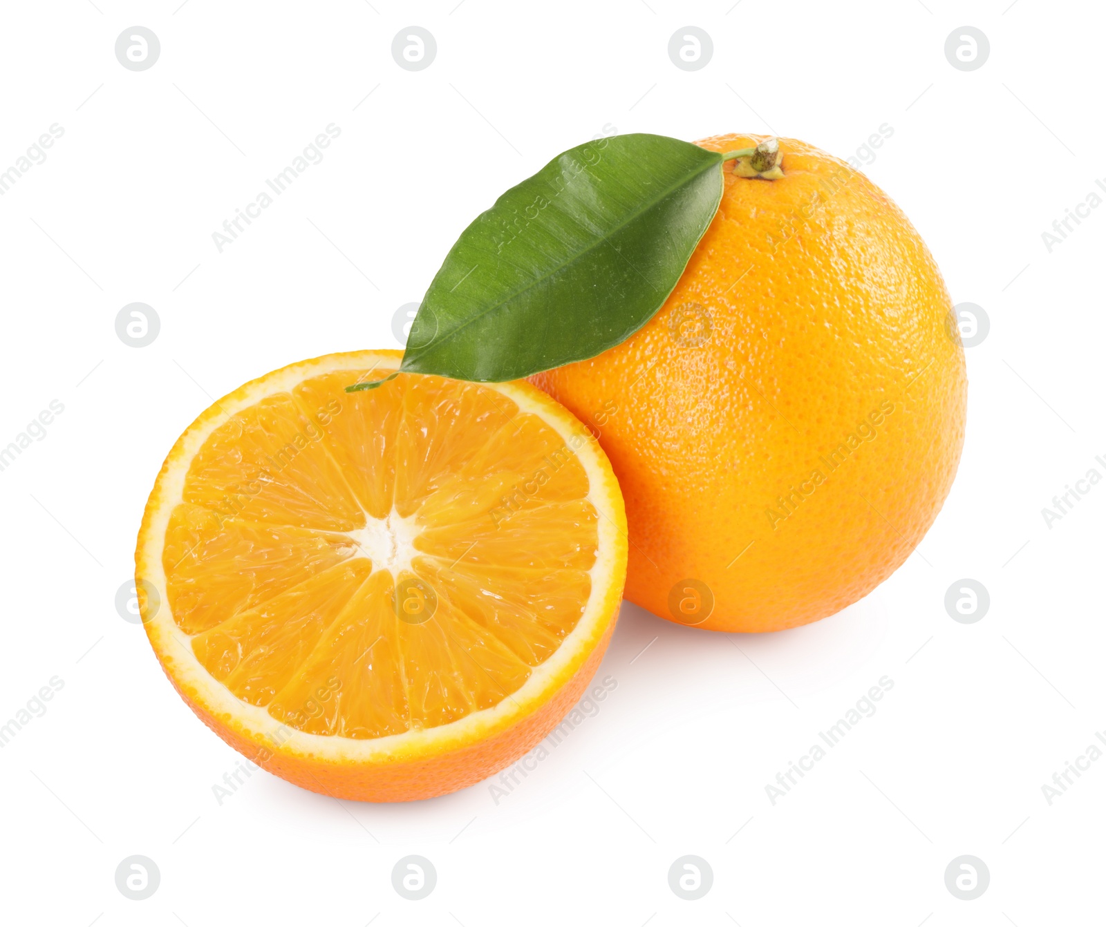 Photo of Whole and cut ripe oranges isolated on white