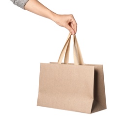 Woman holding paper shopping bag isolated on white, closeup