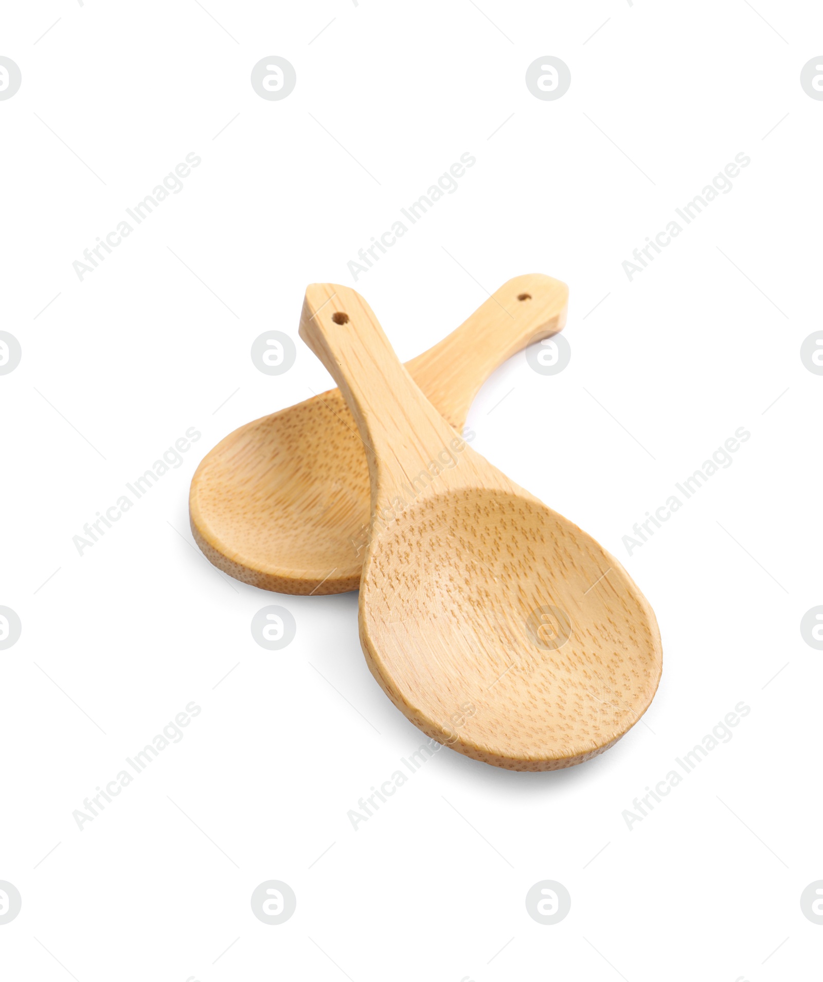 Photo of Two new wooden spoons on white background