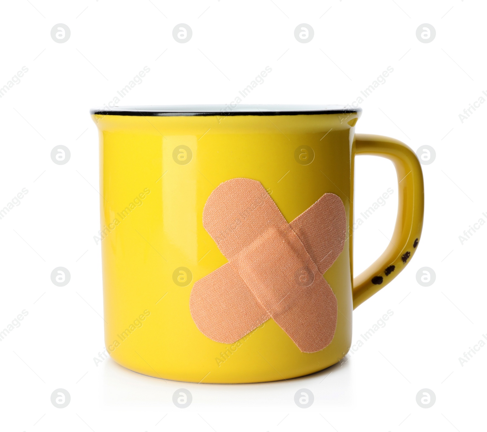 Photo of Mug with sticking plasters isolated on white