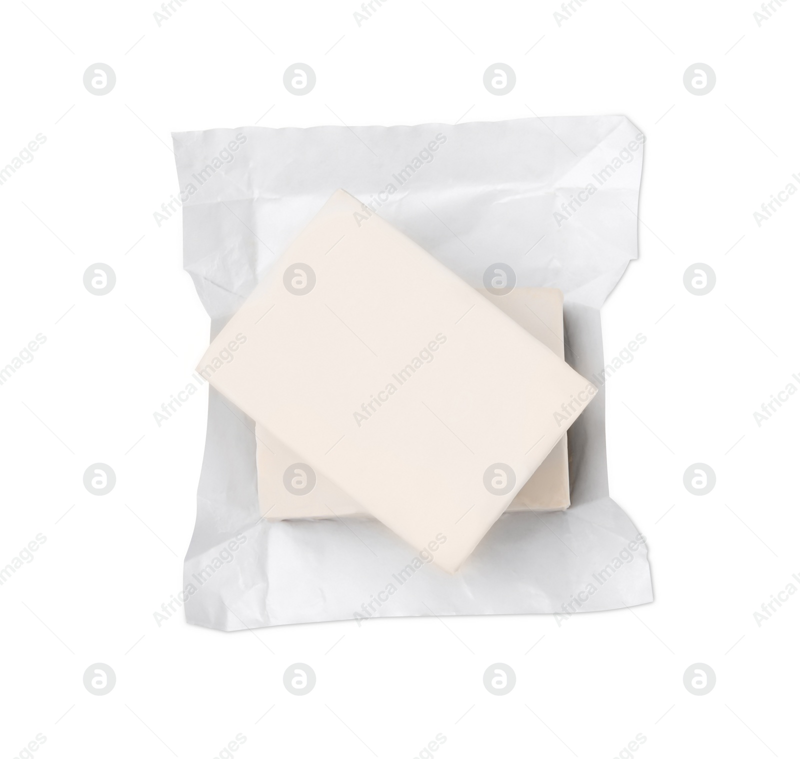 Photo of Blocks of compressed yeast on white background, top view