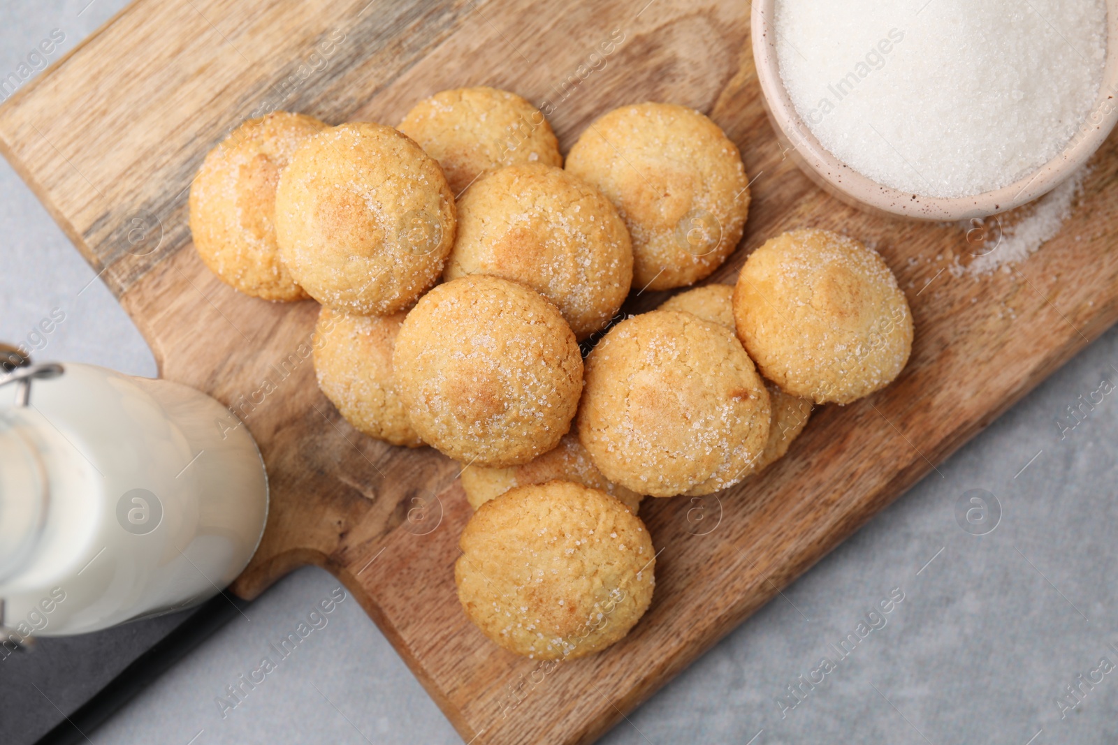 Photo of Tasty fresh sugar cookies on grey table, top view