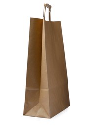 Photo of Kraft shopping paper bag isolated on white