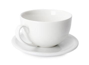 Photo of Ceramic cup and saucer isolated on white