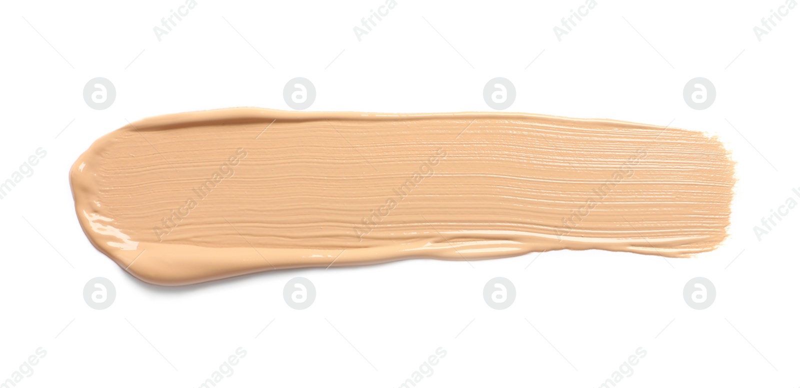 Photo of Smear of skin foundation isolated on white, top view