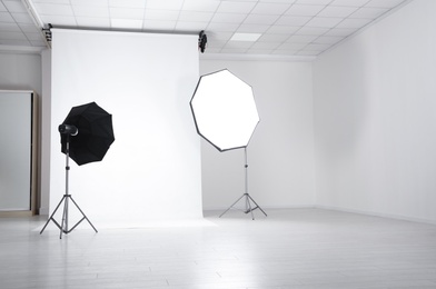 Photo of Photo studio interior with set of professional equipment