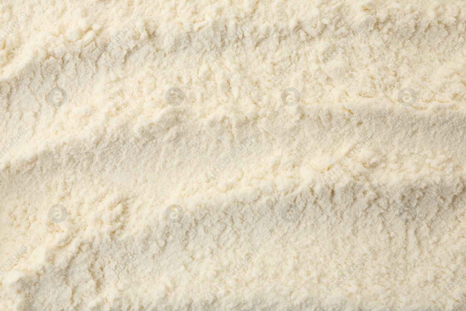 Photo of Texture of baking powder as background, top view