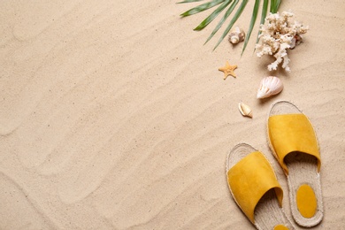 Photo of Flat lay composition with beach items on sand, space for text. Summer vacation