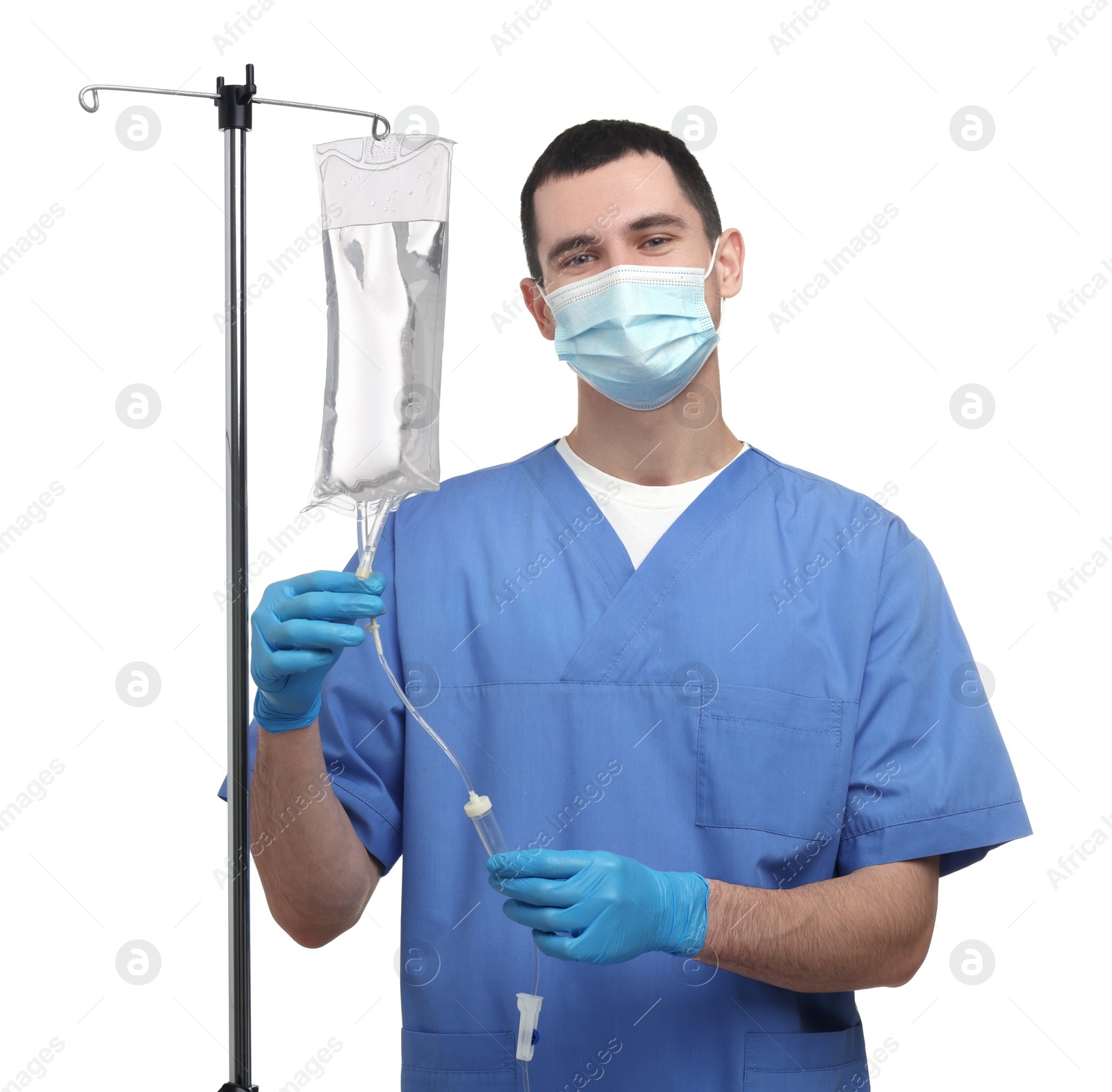 Photo of Nurse setting up IV drip on white background