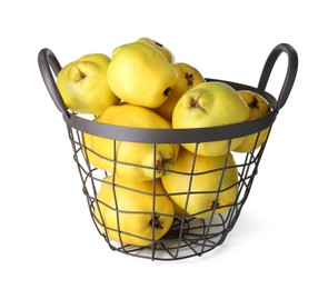 Basket with delicious fresh ripe quinces isolated on white