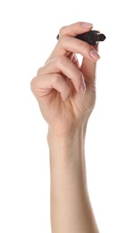 Woman holding black marker on white background, closeup