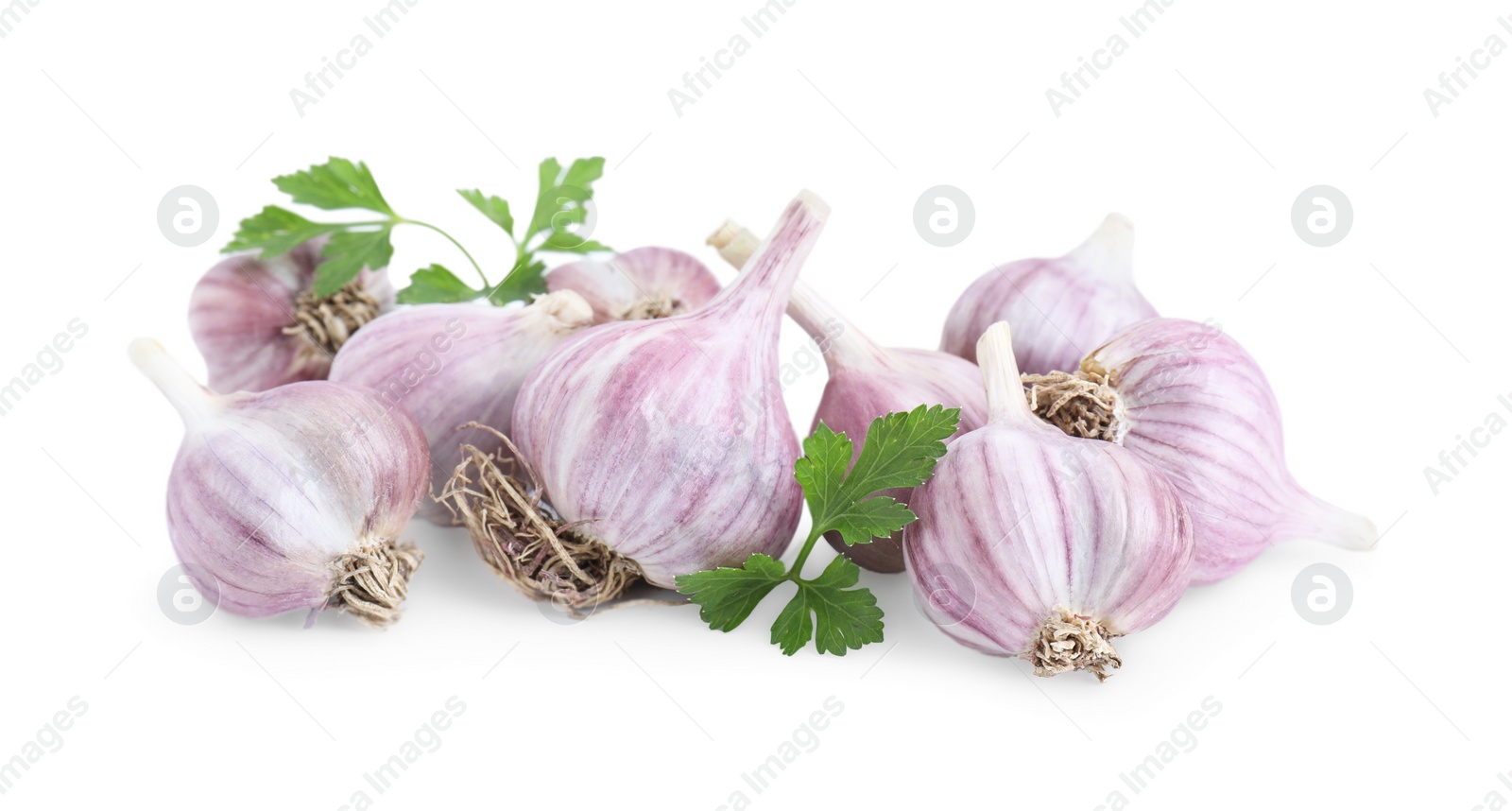 Photo of Fresh garlic heads and parsley isolated on white