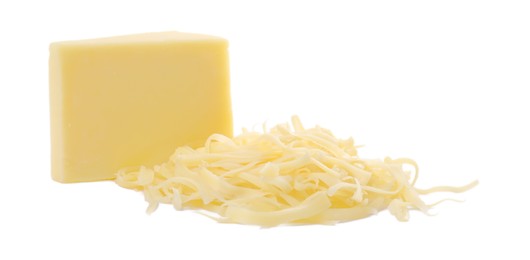 Photo of Grated and whole piece of cheese isolated on white