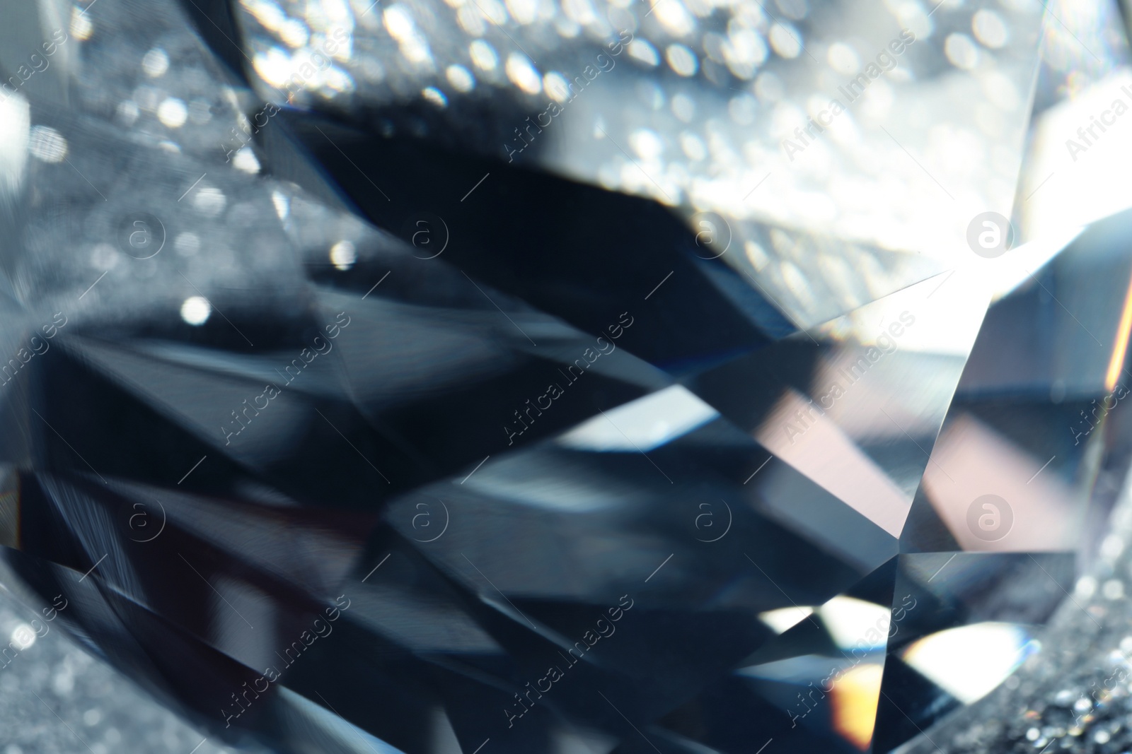 Photo of Beautiful dazzling diamond as background, closeup view