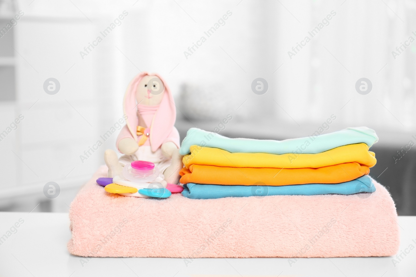 Photo of Baby accessories on table in nursery room