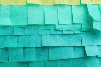 Cut tissue paper in different colors as background