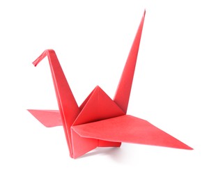 Photo of Origami art. Beautiful red paper crane isolated on white