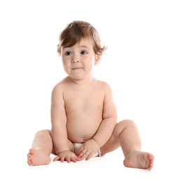 Photo of Cute little baby in diaper on white background