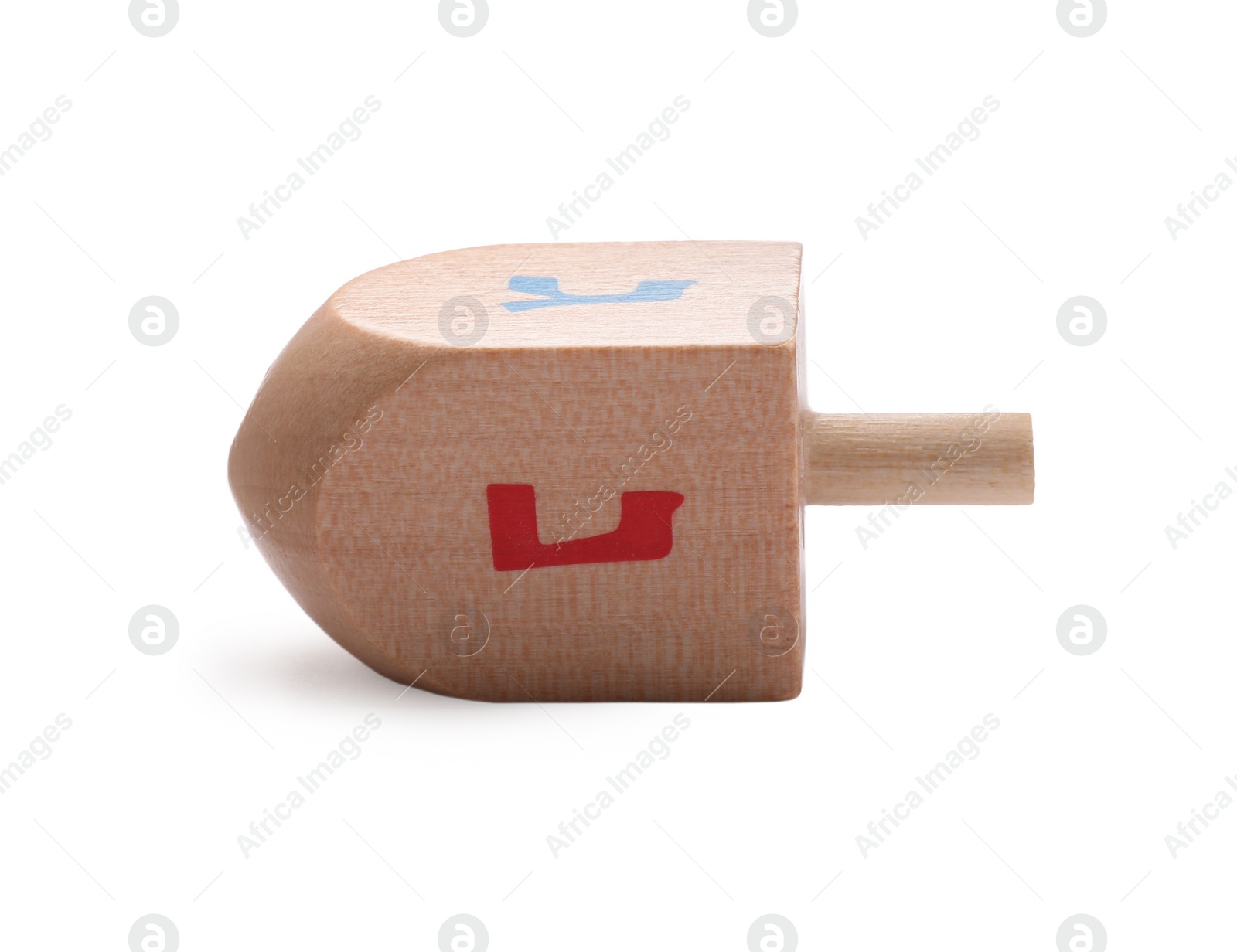 Photo of Wooden dreidel isolated on white. Traditional Hanukkah game