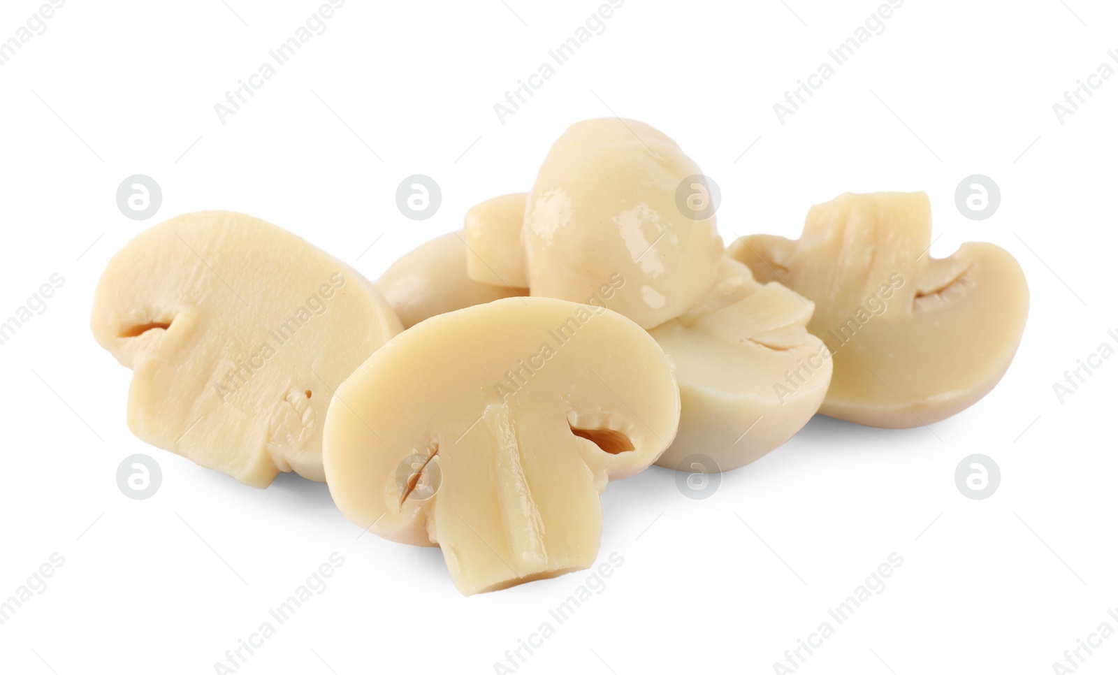 Photo of Cut delicious marinated mushrooms isolated on white