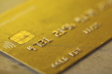 Plastic credit card on table, macro view