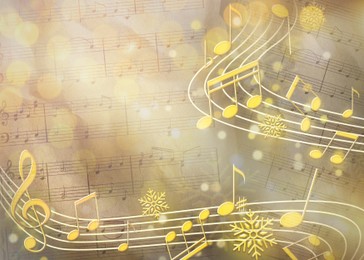 Image of Treble clef, music notes, snowflakes and sheet with musical symbols. Bokeh effect