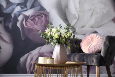 Photo of Beautiful bouquet of flowers on table in room. Stylish interior design