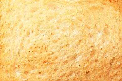 Photo of Toasted bread as background, closeup