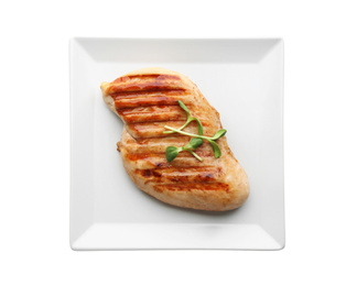 Tasty grilled chicken fillet with green sprouts isolated on white, top view