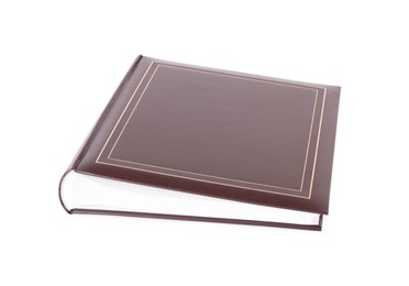 Photo of Brown closed photo album isolated on white