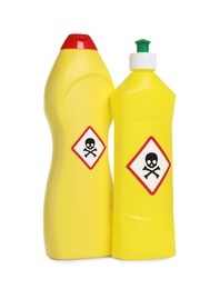 Bottles of toxic household chemicals with warning signs on white background