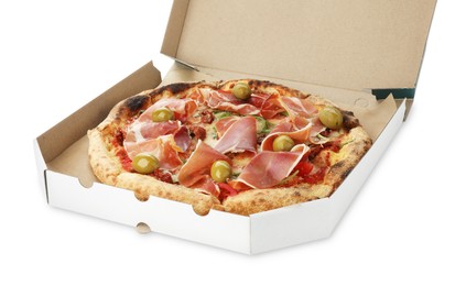 Tasty pizza with cured ham, olives and sun-dried tomato in cardboard box isolated on white