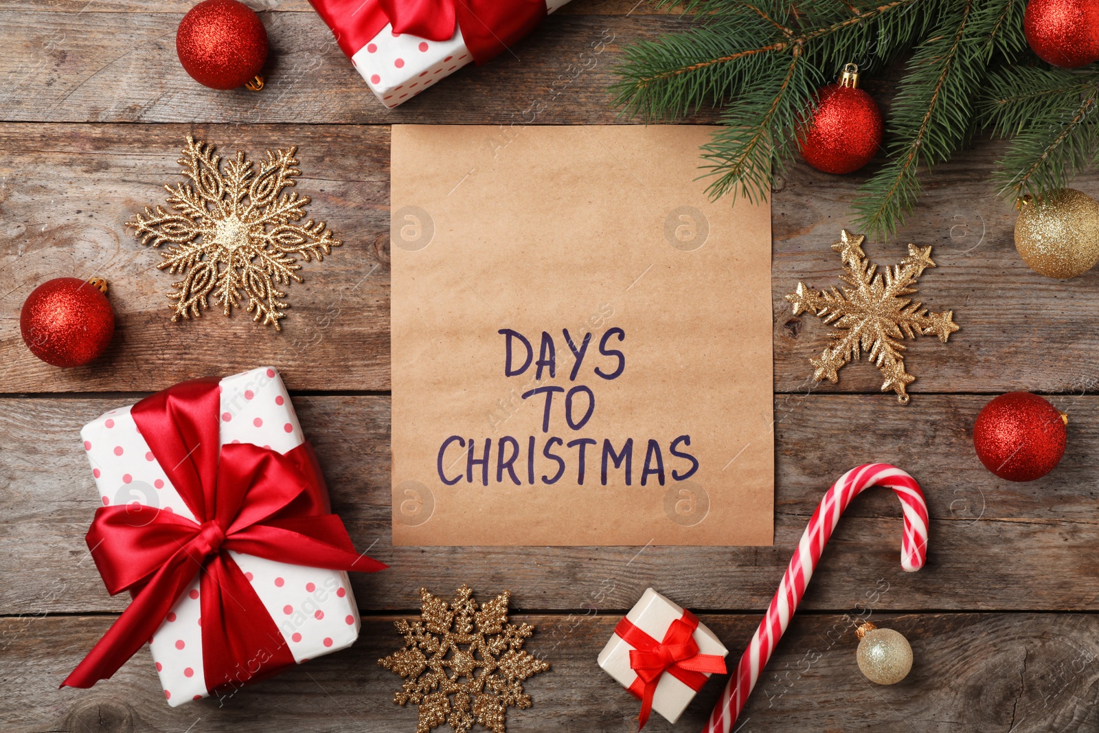 Photo of Flat lay composition with festive decor on wooden background. Christmas countdown