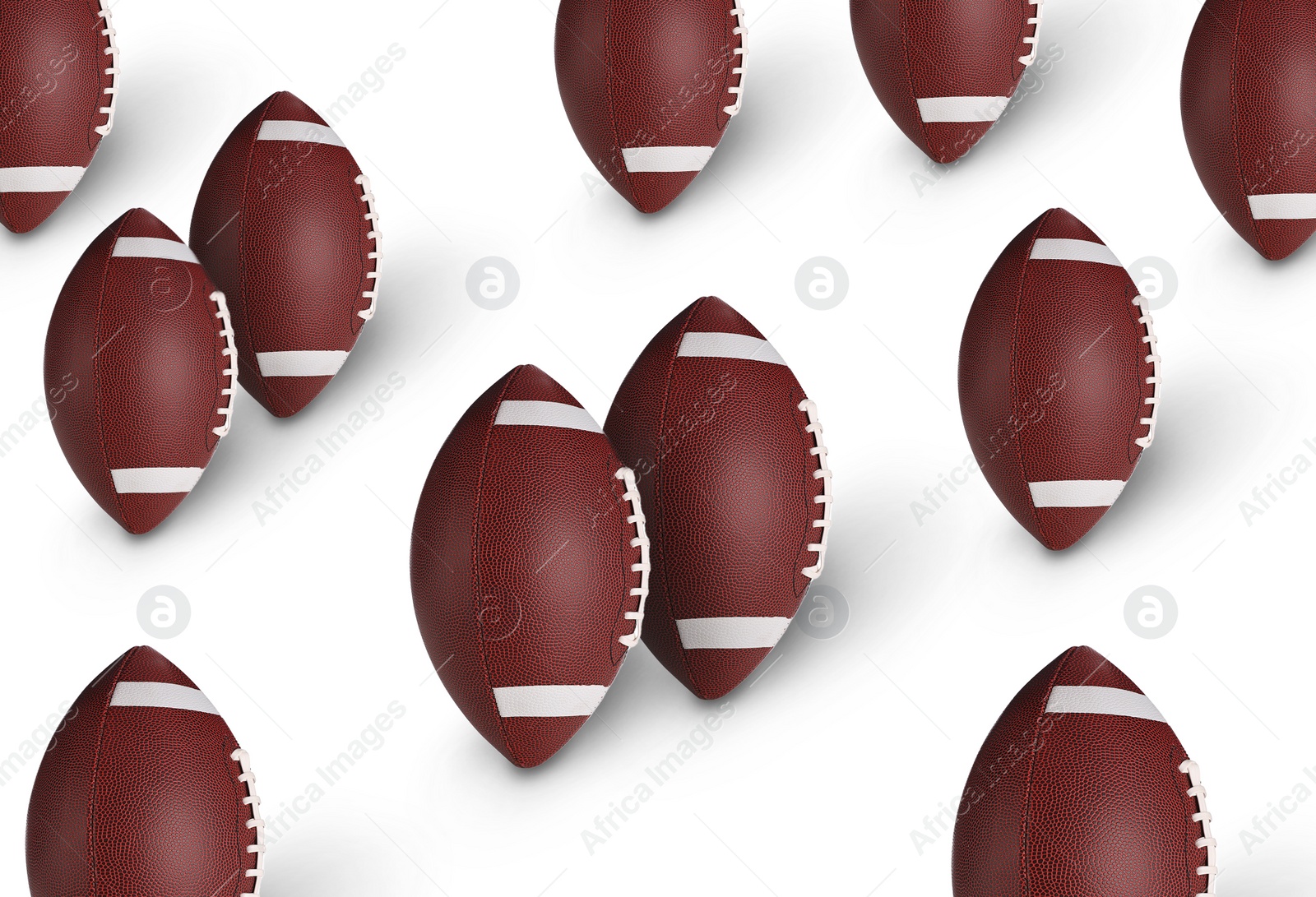 Image of Many leather American football balls on white background