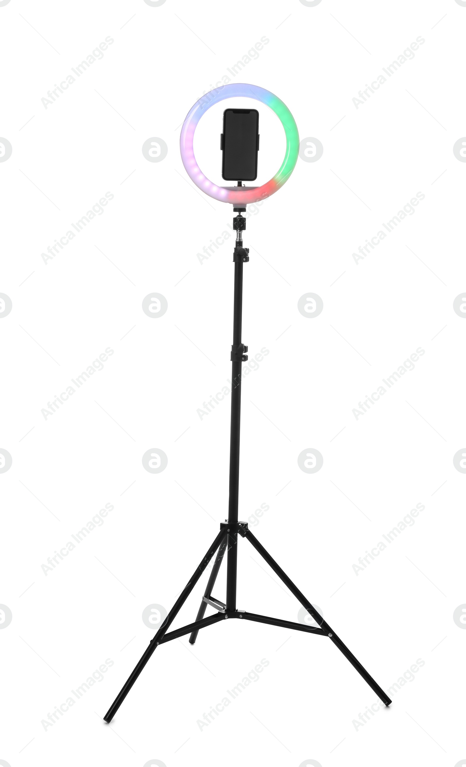 Photo of Tripod with ring light and smartphone isolated on white