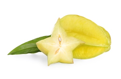 Photo of Cut and whole carambolas with green leaf on white background