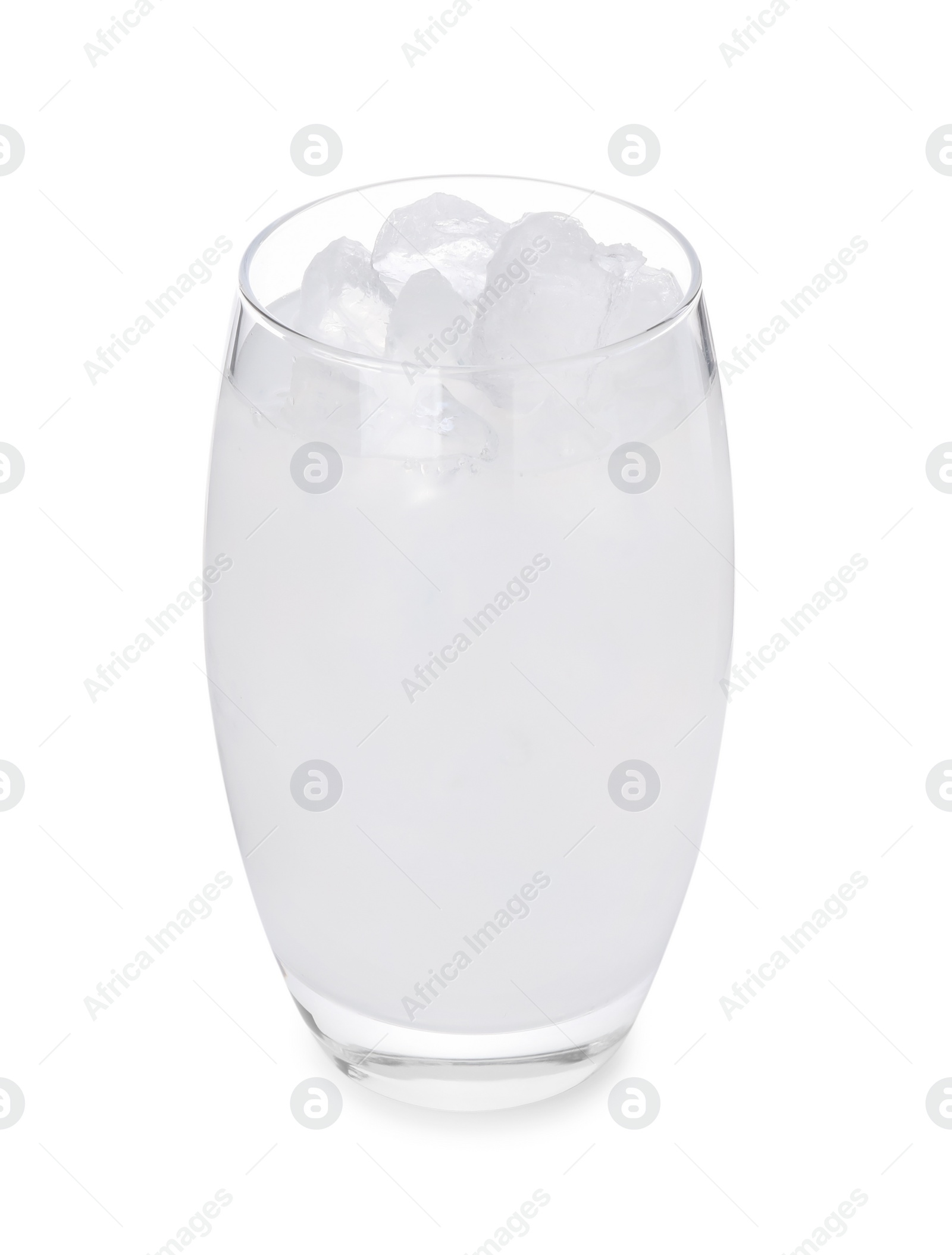 Photo of Glass of coconut water with ice cubes isolated on white