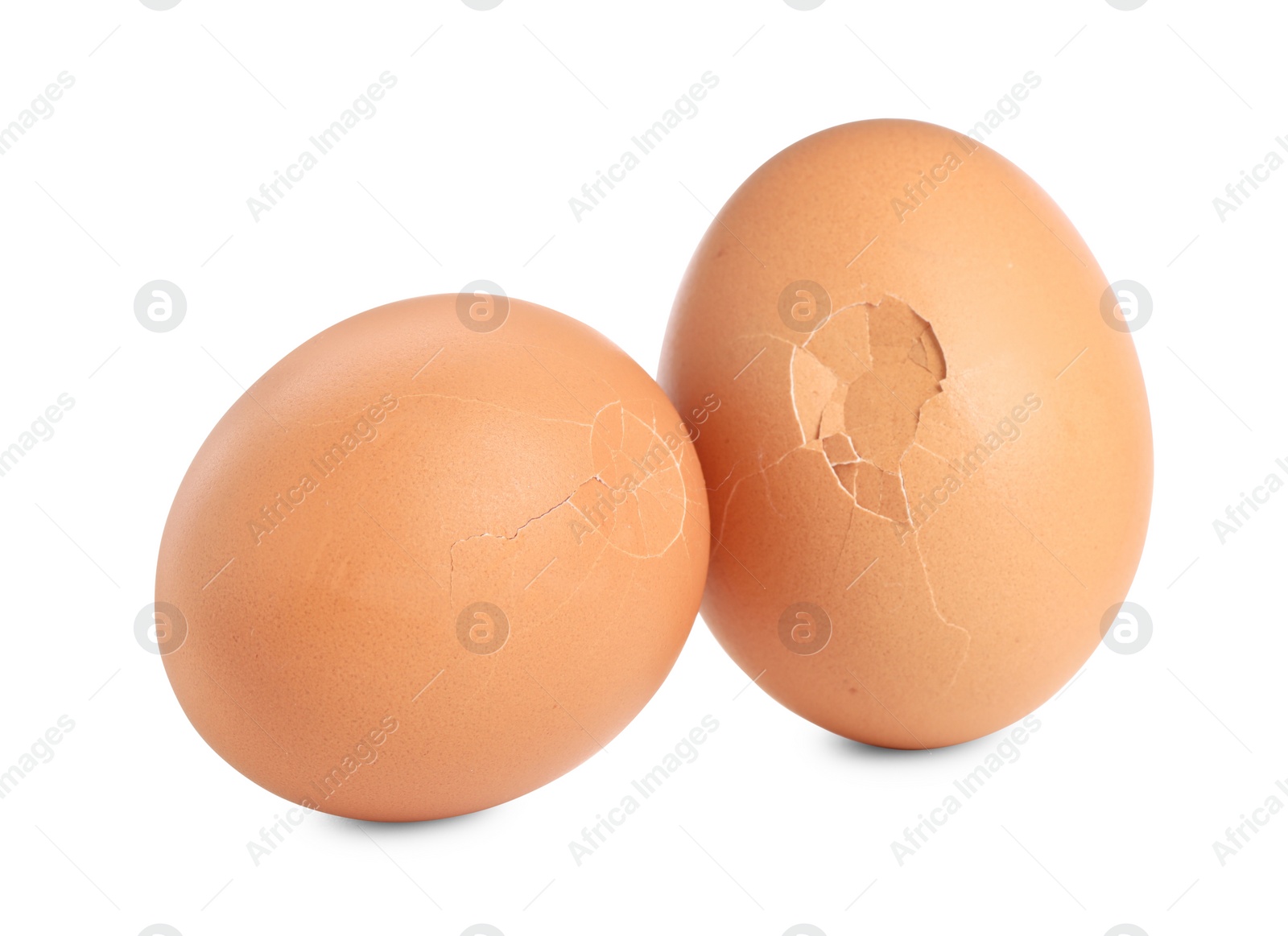 Photo of Whole and cracked chicken eggs isolated on white